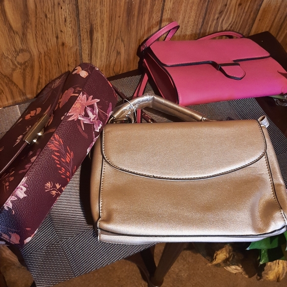 ❤ 3 New Purses Will sale separately at 5.00 each Bundle any 2 $15 items for $25. - Picture 2 of 3